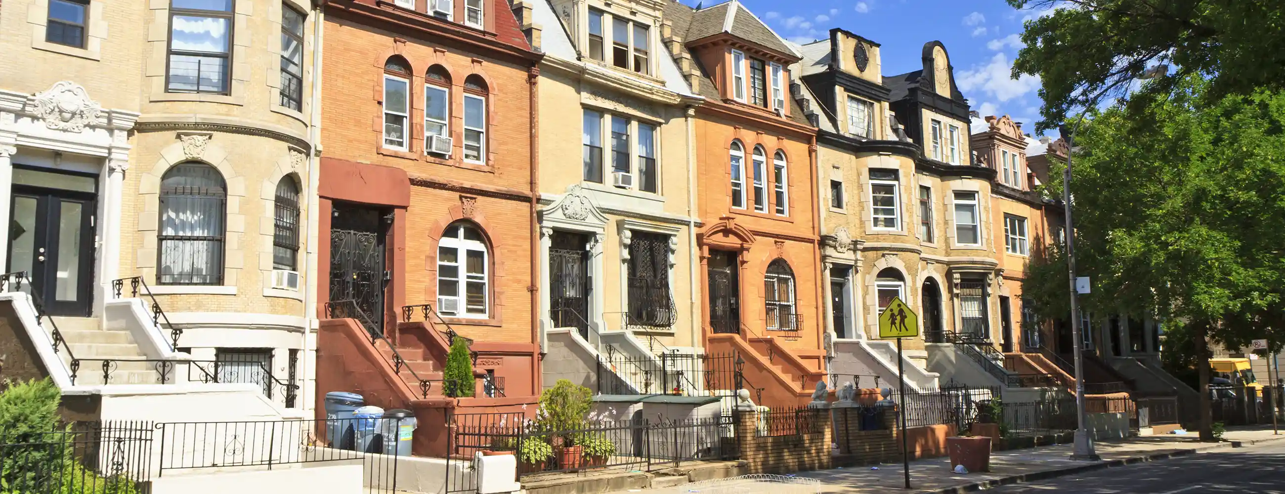 Cheerful townhouses along street in Crown Heights, Brooklyn