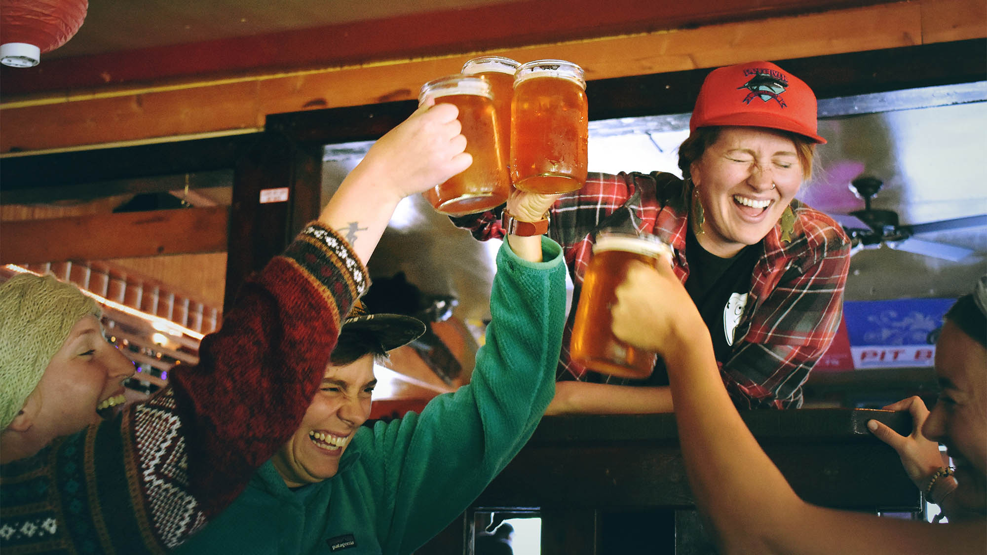 People Cheersing in Bar