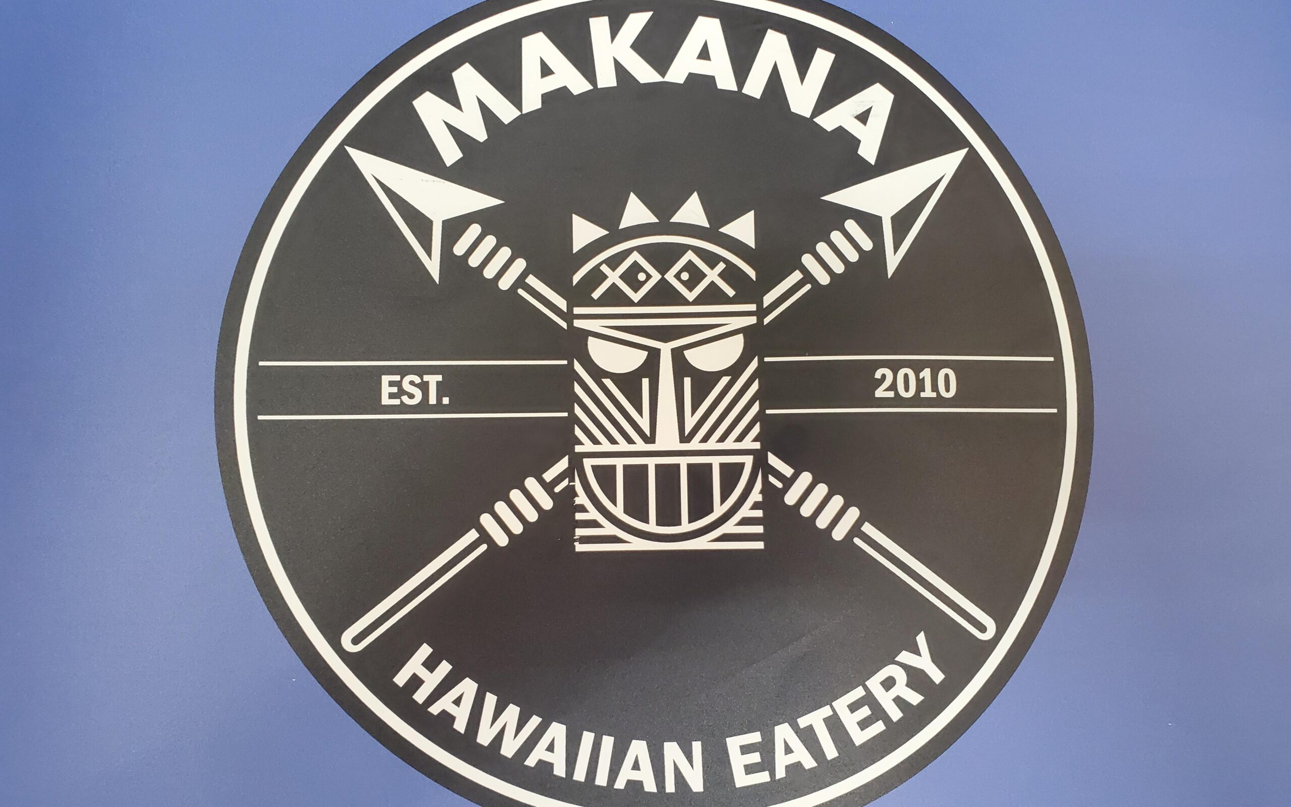 Makana Hawaiian Eatery Sign on Blue Wall