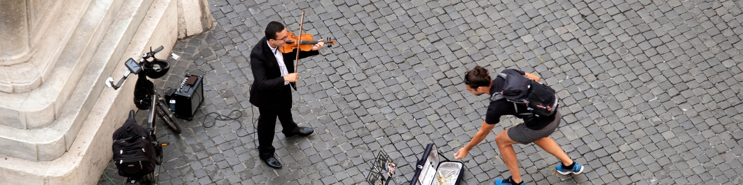 Street Violinist and Spectator Placing Money in Tip Case