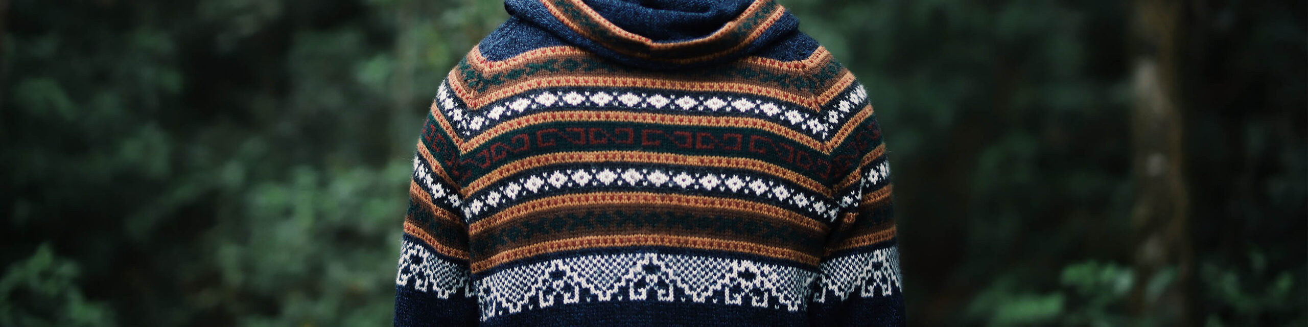 Orange and white knit winter men's sweater closeup