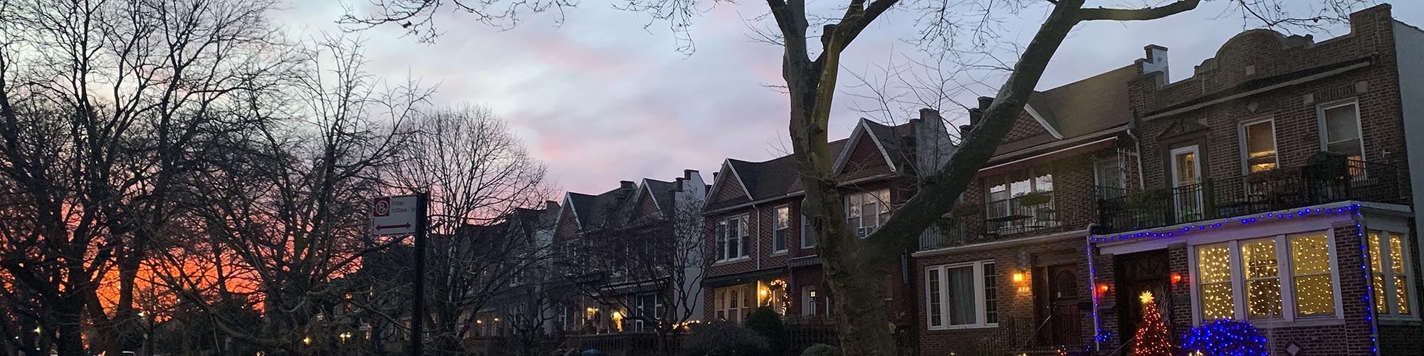 Pink sky sunset over Brooklyn brownstones