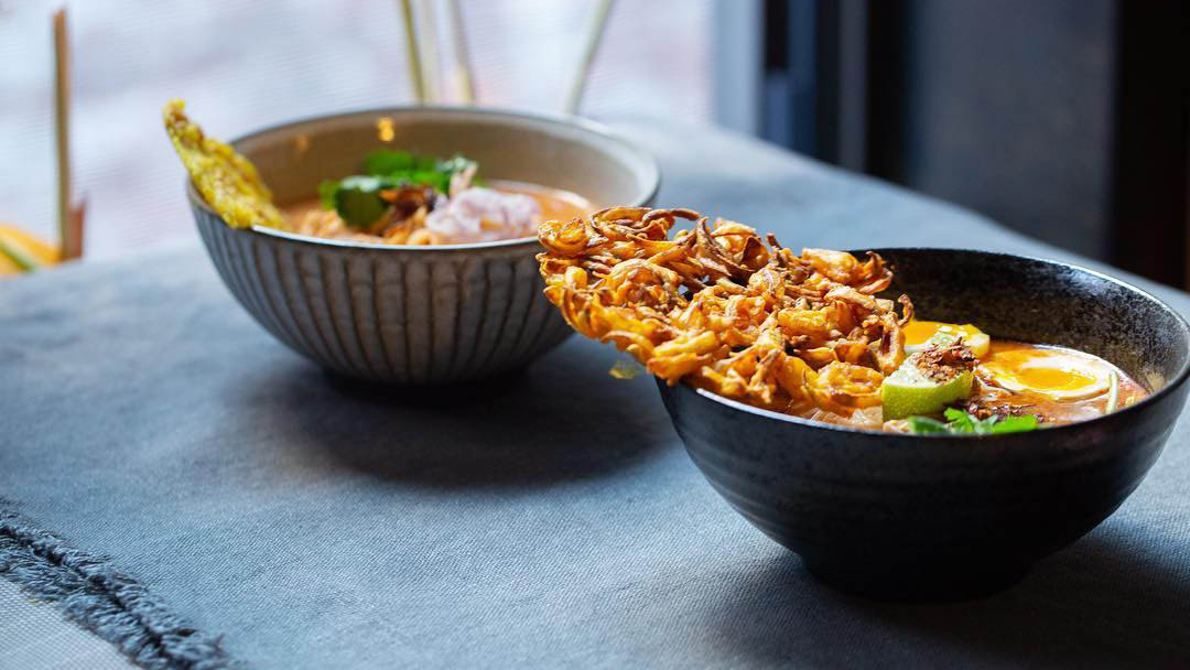 Bowl of mohinga and other soup side by side