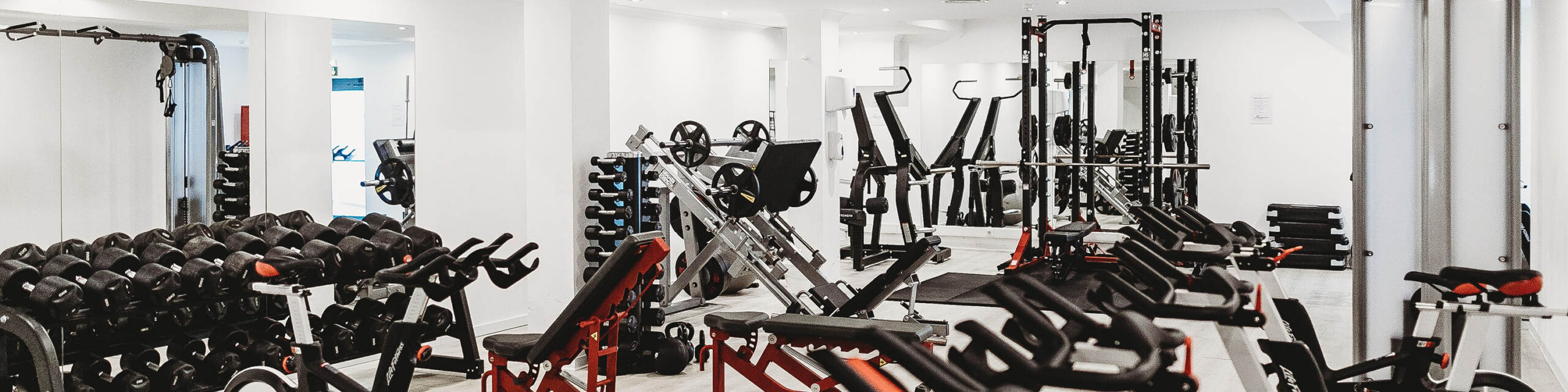 Empty Gym with Black Equipment