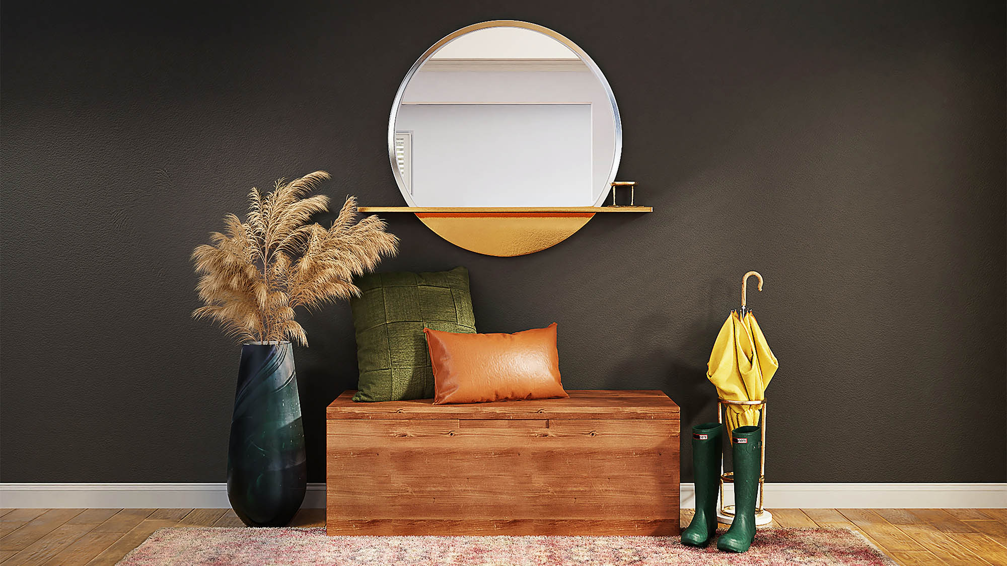 Foyer with dark gray wall and large center round mirror above a wooden chese with orange and green pillow flanked by green hunter boots with yellow umbrella and green planter