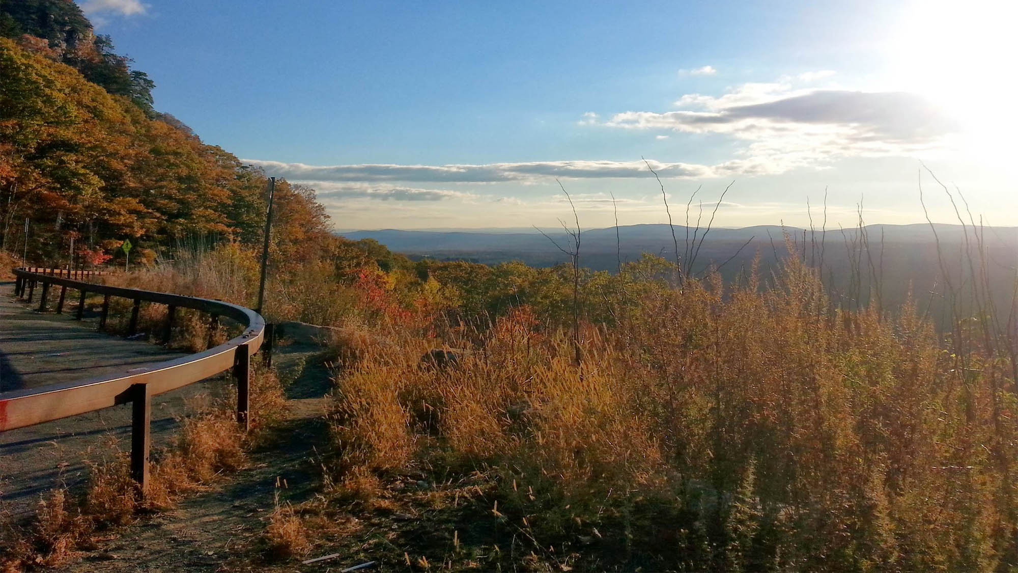 Curvy scenic fall road overlooking Gunks cliffs in New York