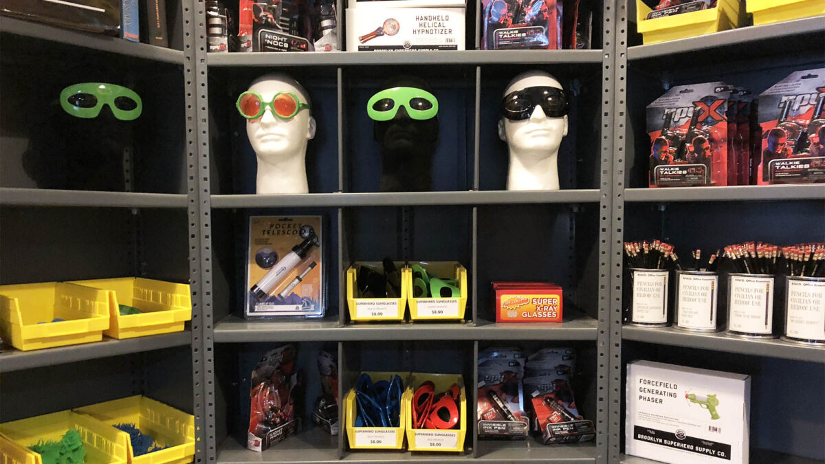 Superhero supply store items on shelves