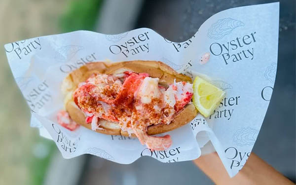 Lobster roll in branded Oyster Party paper