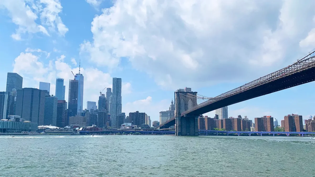 Brooklyn Bridge and East River with skyline in background