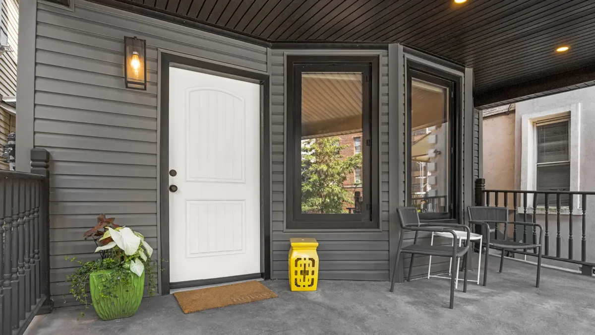 VInyl-sided home facade and porch
