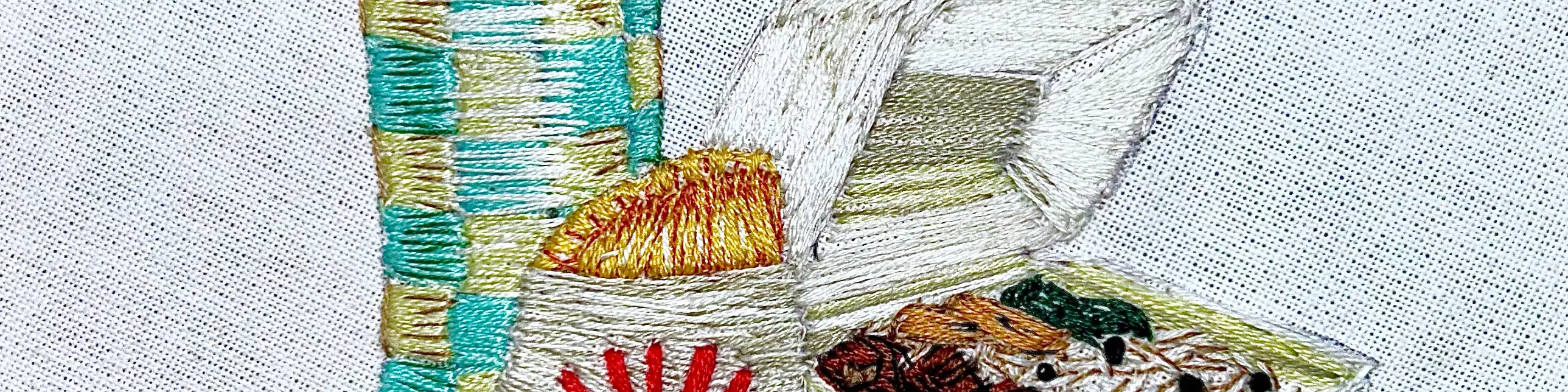 Teaser cropped photo of embroidered foods artwork