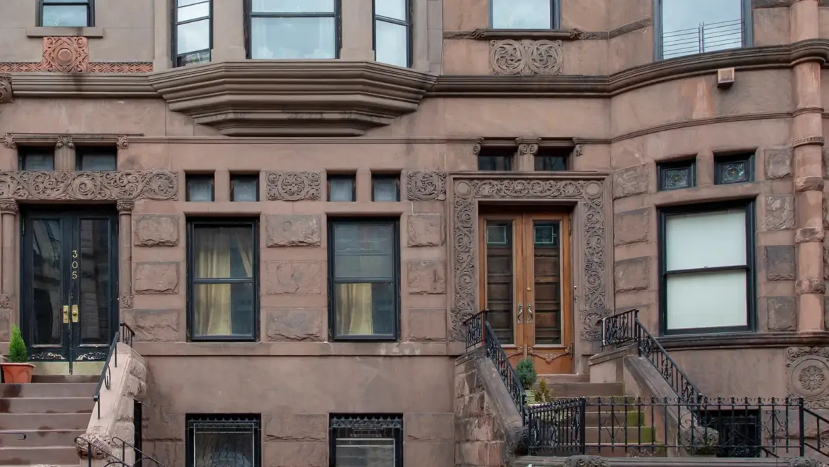 Brownstone exterior with two stoops