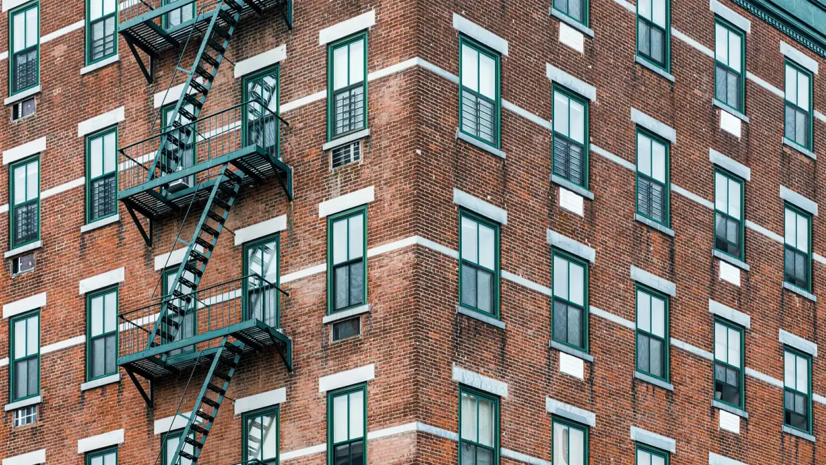 Corner shot of Brooklyn apartment building with lots of windows