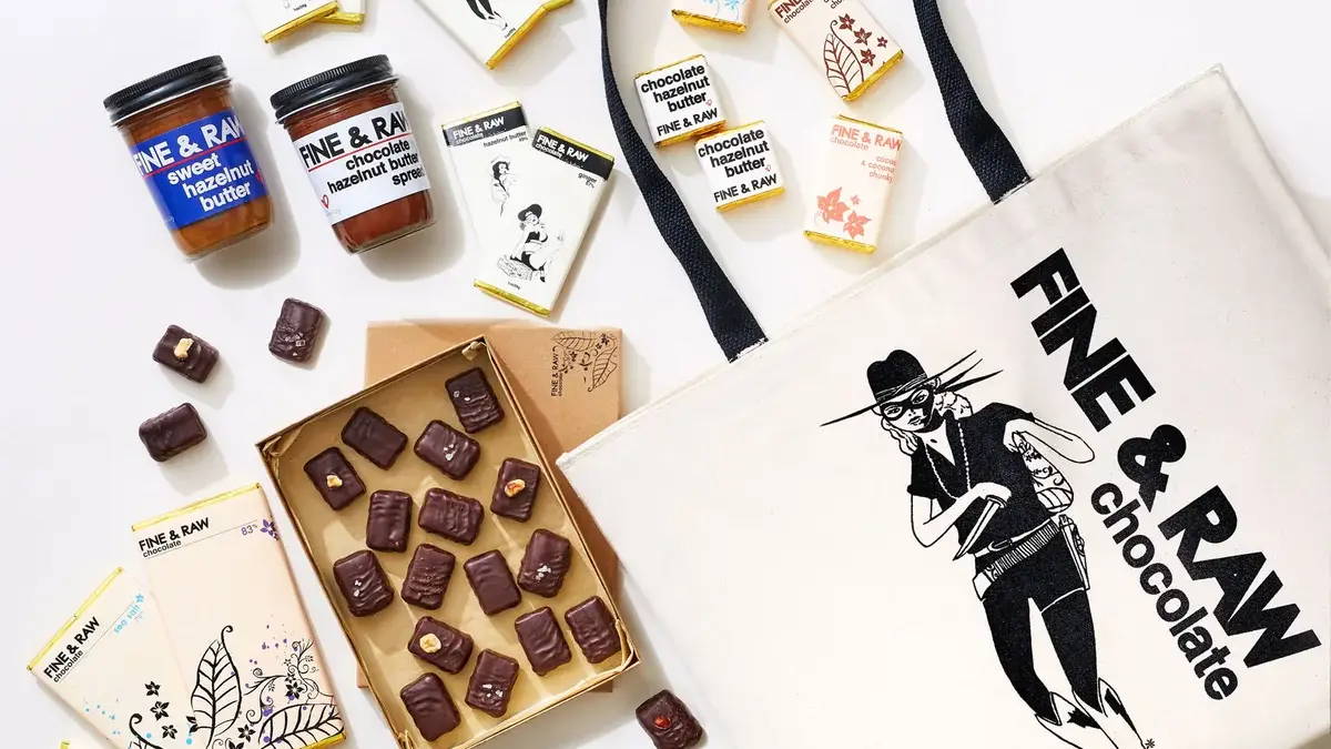 Two chocolate spreads, box of truffles, various bars and Fine & Raw tote bag