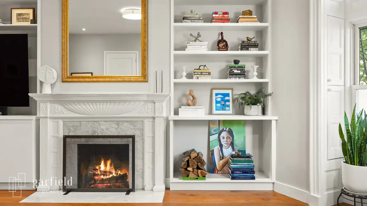 Fireplace mantel and built-in shelving 